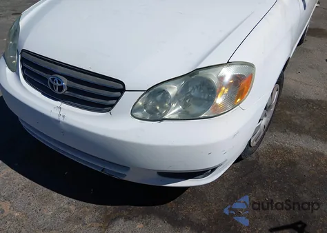 2003 Toyota Corolla Le z USA, uszkodzony, nr VIN JTDBR32E730017228